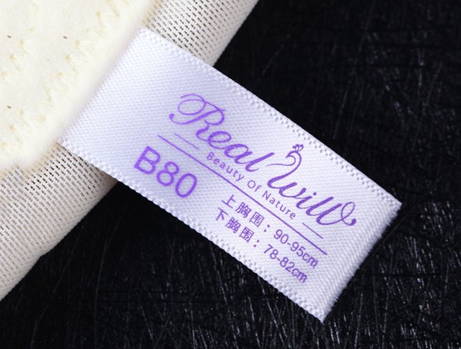 White ribbon label with size on custom underwear